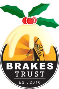 Brakes Trust logo with a Christmas Pud style topping of cream and holly